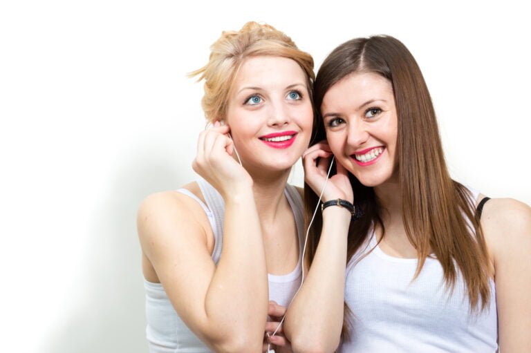 Woman listening to music with wired headset