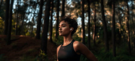 Female with a breggz wearables in her ear